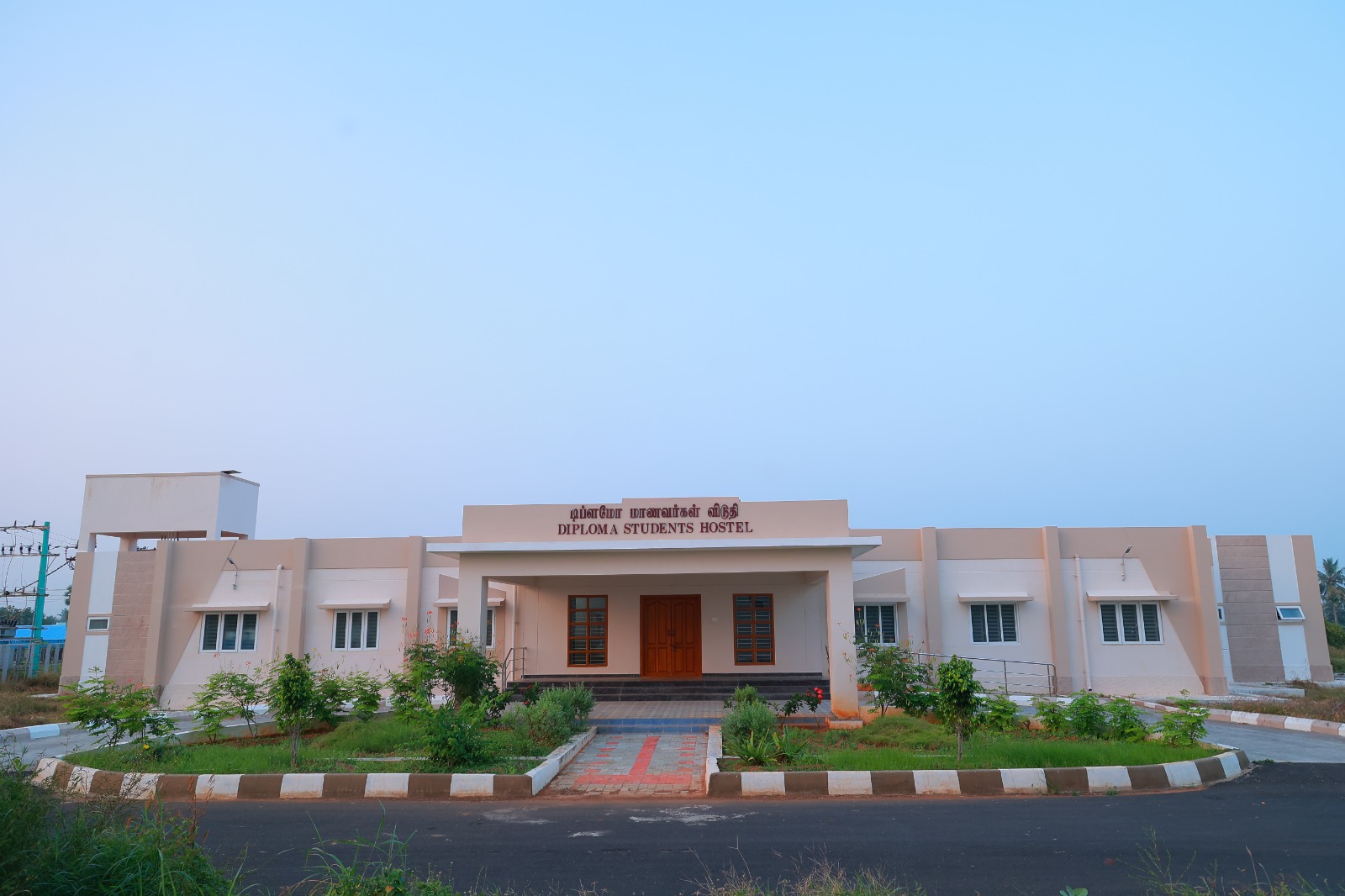 Students enjoying community meal in hostel mess